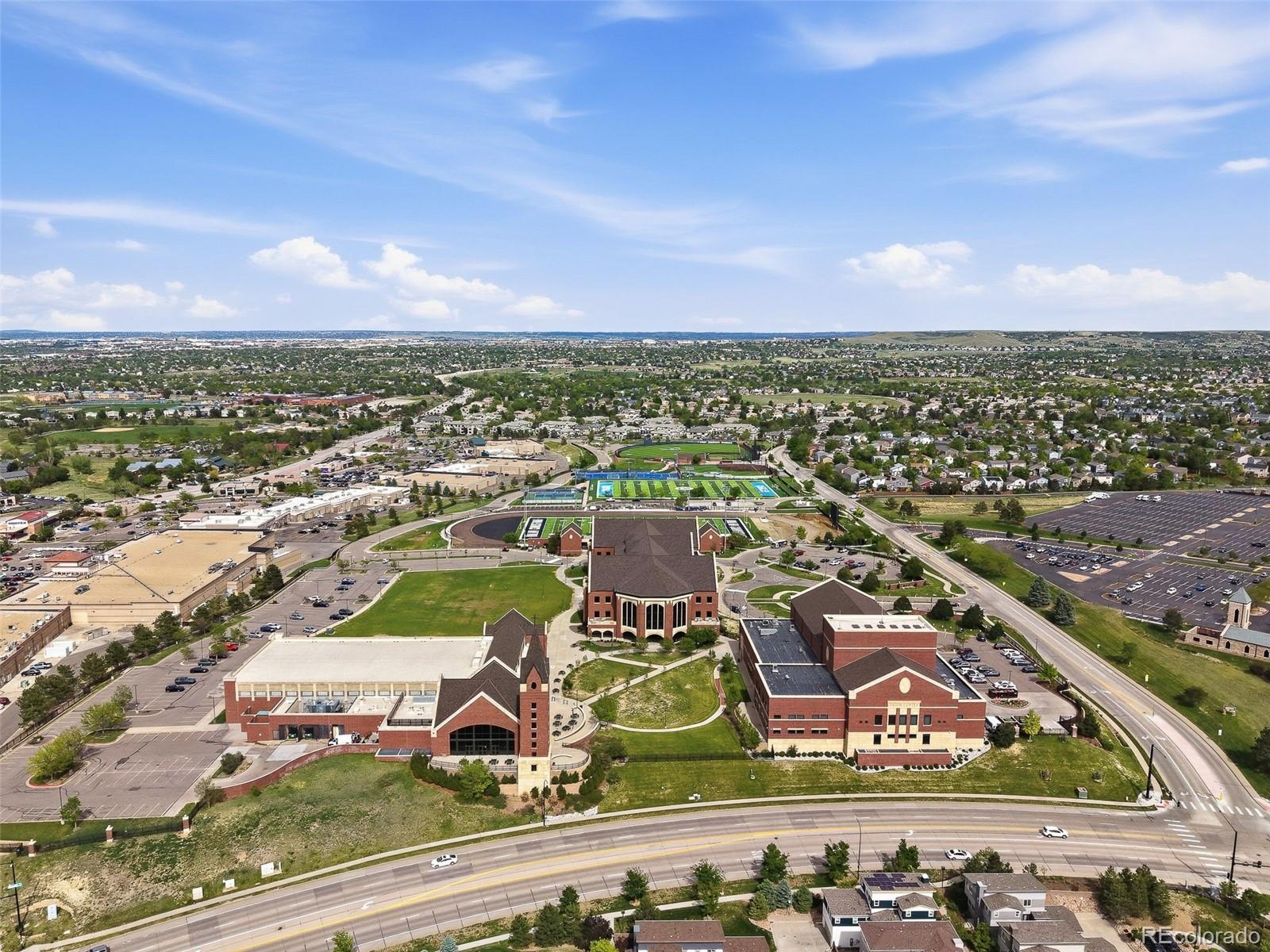 9602 Dunning Circle Highlands Ranch, CO 80126 - Photo 49 of 50 an aerial view of residential houses with outdoor space
