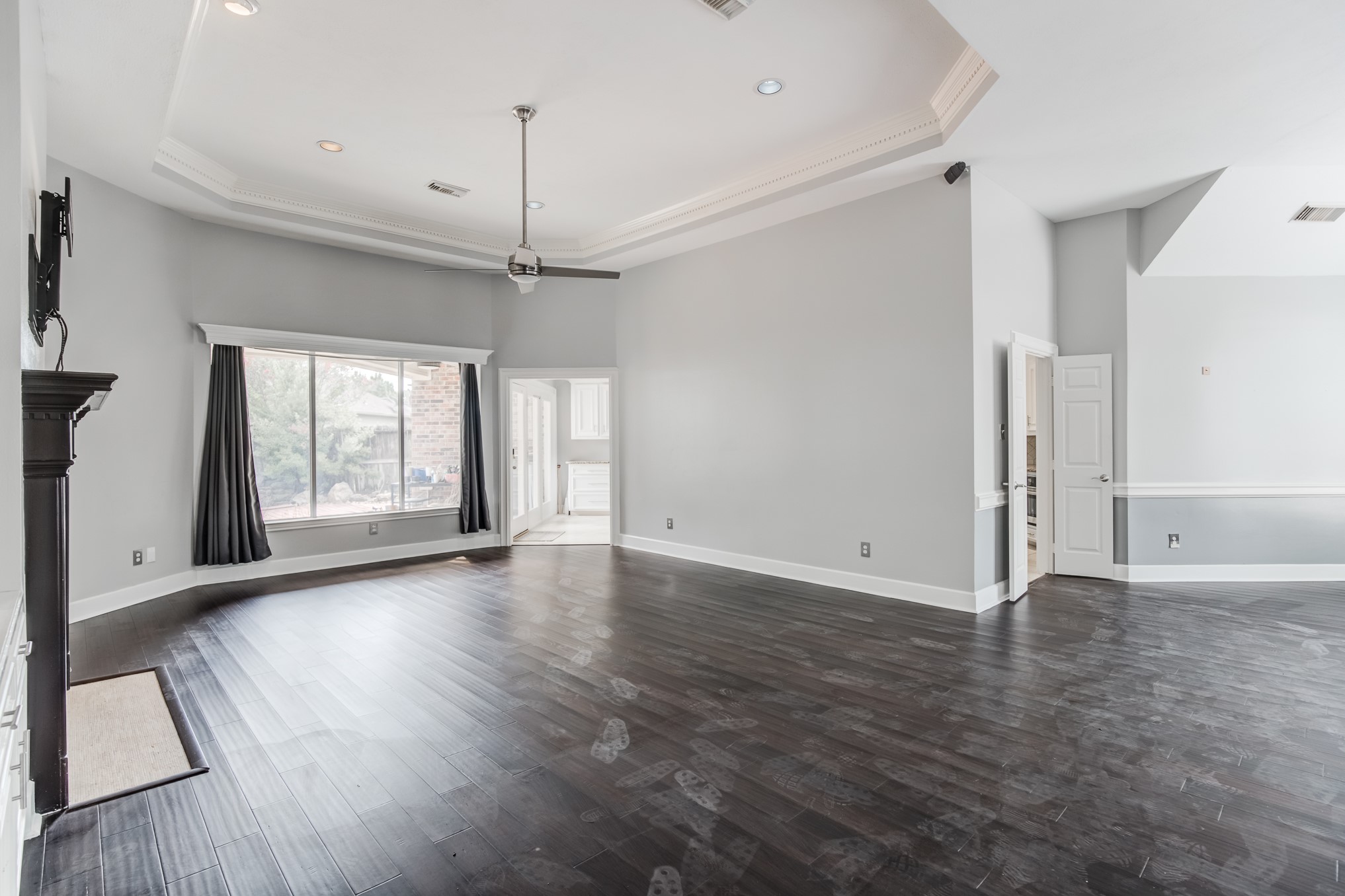 11618 Snowmass Drive Houston, TX 77070 - Photo 11 of 36 a view of an empty room with wooden floor and a window