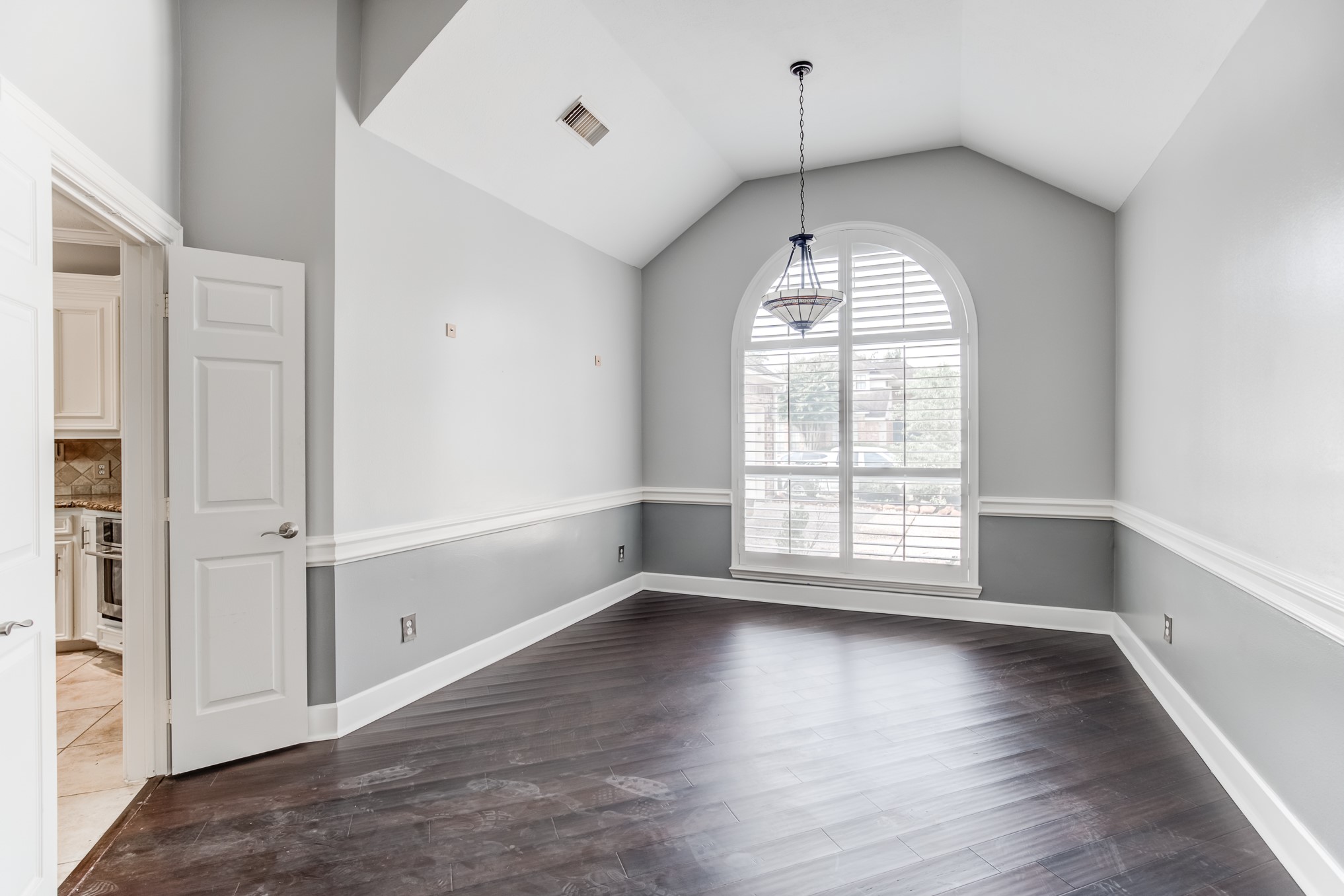 11618 Snowmass Drive Houston, TX 77070 - Photo 19 of 36 wooden floor in an empty room with a window