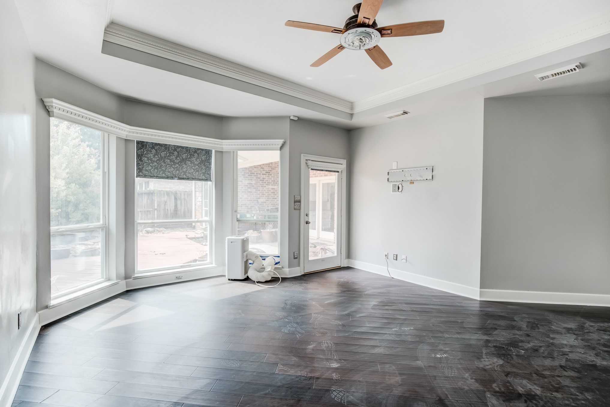 11618 Snowmass Drive Houston, TX 77070 - Photo 21 of 36 a view of empty room with wooden floor and fan