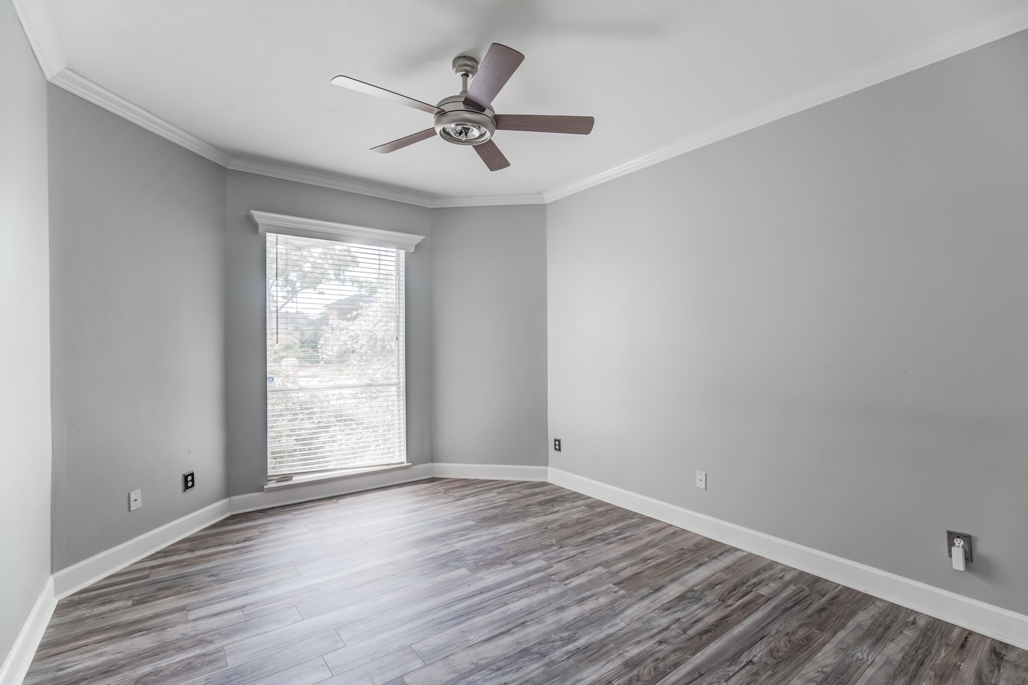 11618 Snowmass Drive Houston, TX 77070 - Photo 31 of 36 wooden floor in an empty room with a window