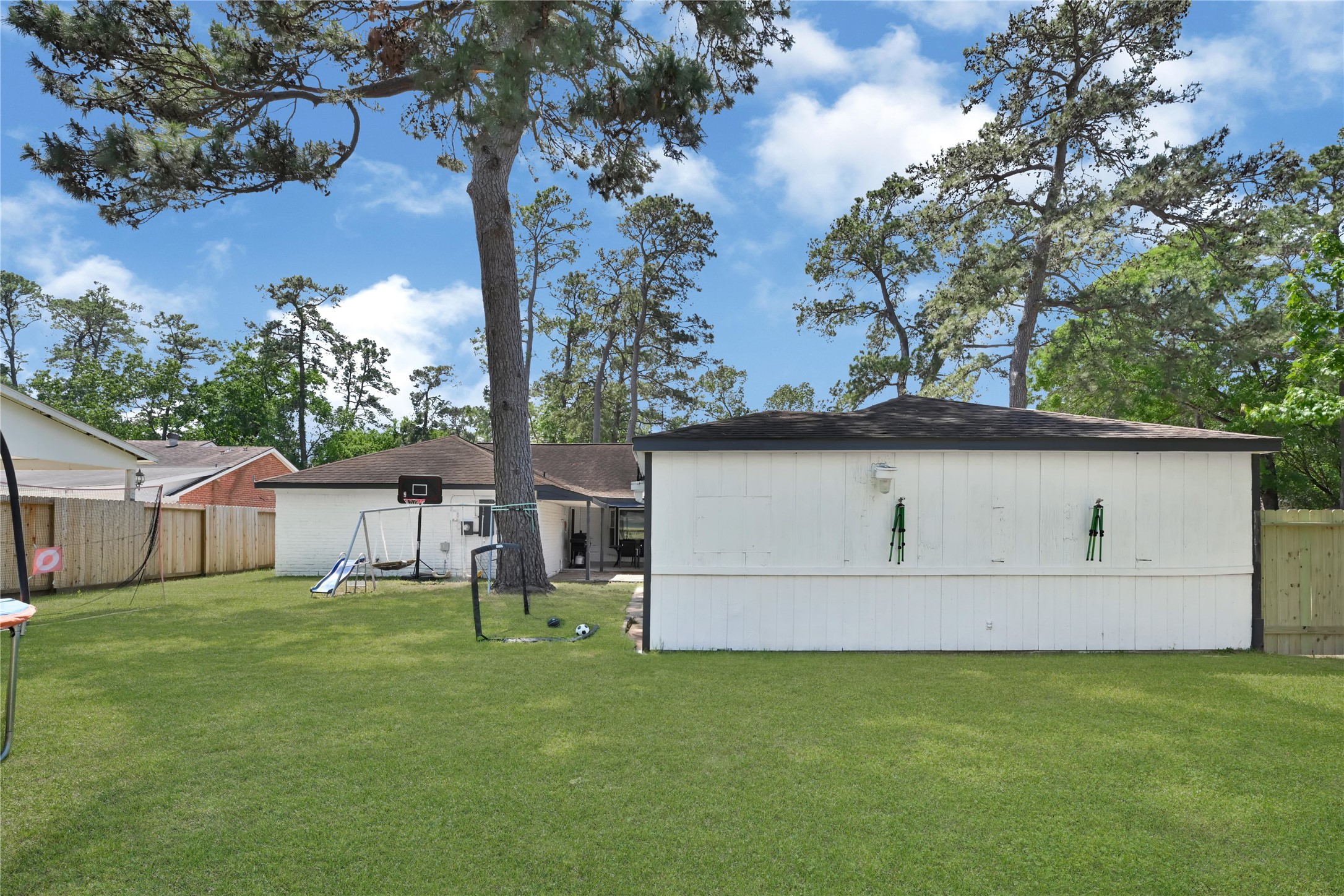 25418 Tuckahoe Lane Spring, TX 77373 - Photo 26 of 26 a view of backyard with small cabin