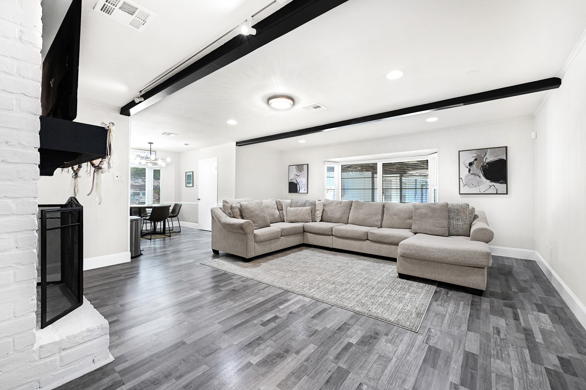 25418 Tuckahoe Lane Spring, TX 77373 - Photo 8 of 26 a living room with furniture and a flat screen tv