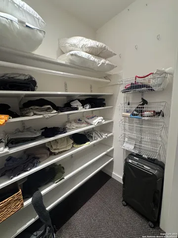 a bed room with a bed and a window