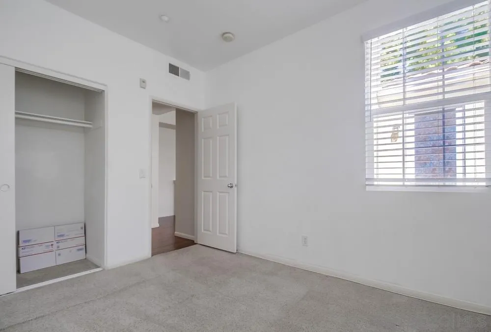 1298 Fools Gold Way, Unit 4 Chula Vista, CA 91913 - Photo 29 of 38 a view of an empty room with a window