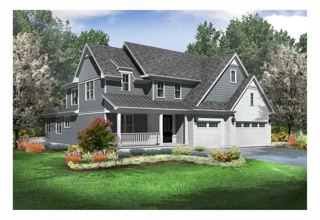 a front view of a house with a yard and trees