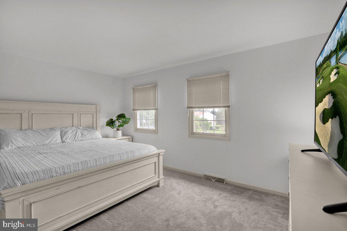 723 West 6th Street Lititz, PA 17543 - Photo 14 of 27 a bedroom with a bed and a window