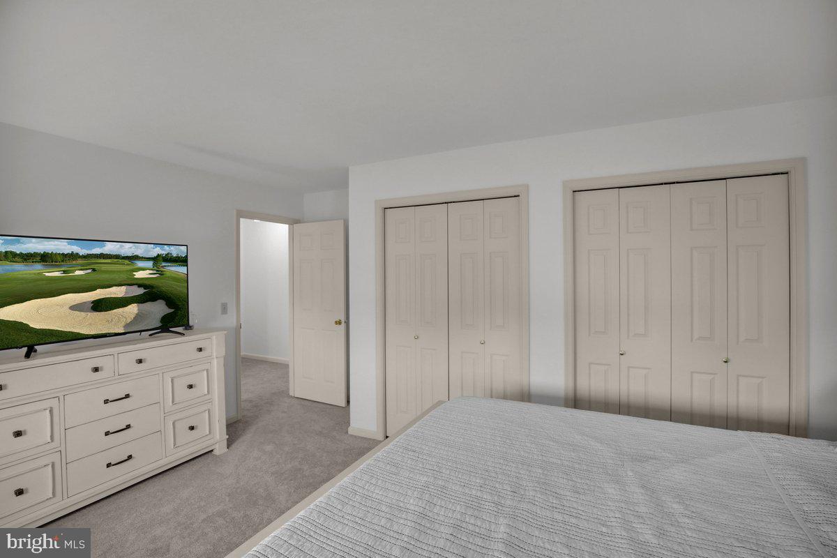 723 West 6th Street Lititz, PA 17543 - Photo 15 of 27 a spacious bedroom with a bed and a dresser