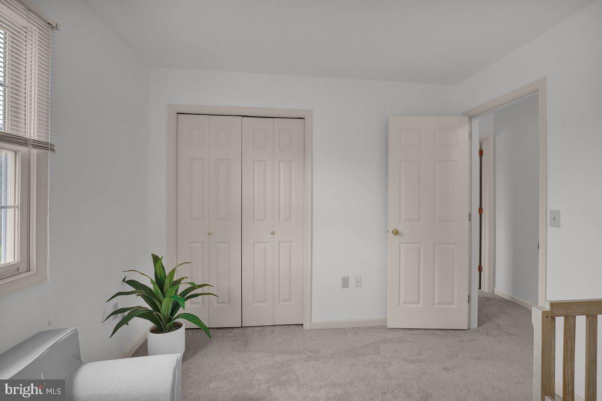 723 West 6th Street Lititz, PA 17543 - Photo 16 of 27 a living room with furniture and a potted plant