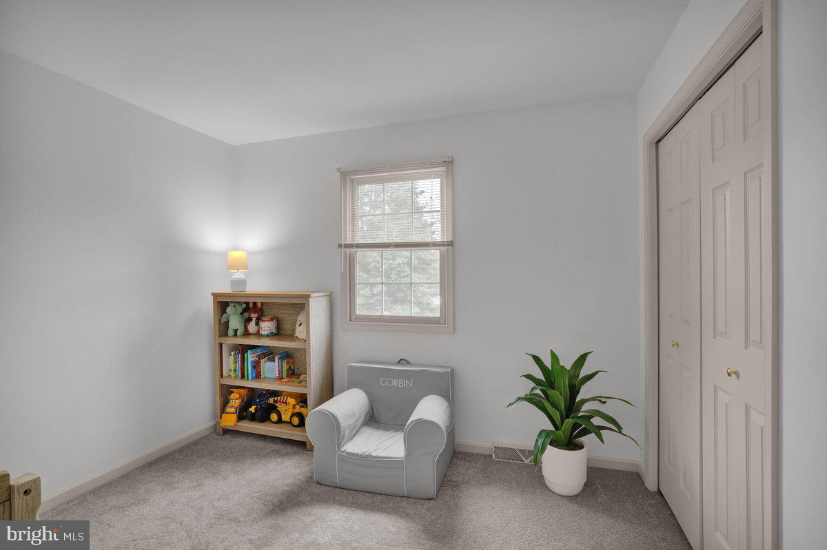 723 West 6th Street Lititz, PA 17543 - Photo 17 of 27 a room with furniture and a potted plant