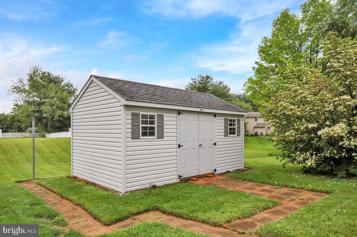 723 West 6th Street Lititz, PA 17543 - Photo 25 of 27 a view of a white house next to a yard with big trees