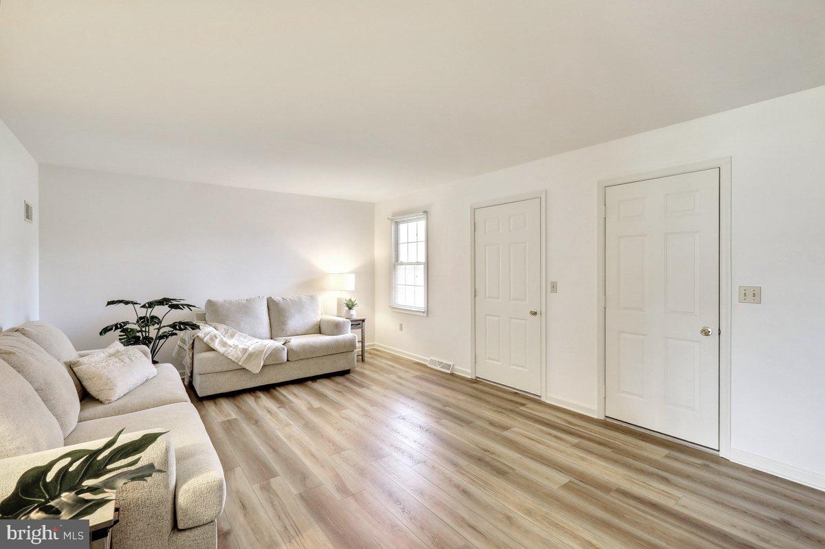 723 West 6th Street Lititz, PA 17543 - Photo 7 of 27 a living room with furniture and wooden floor
