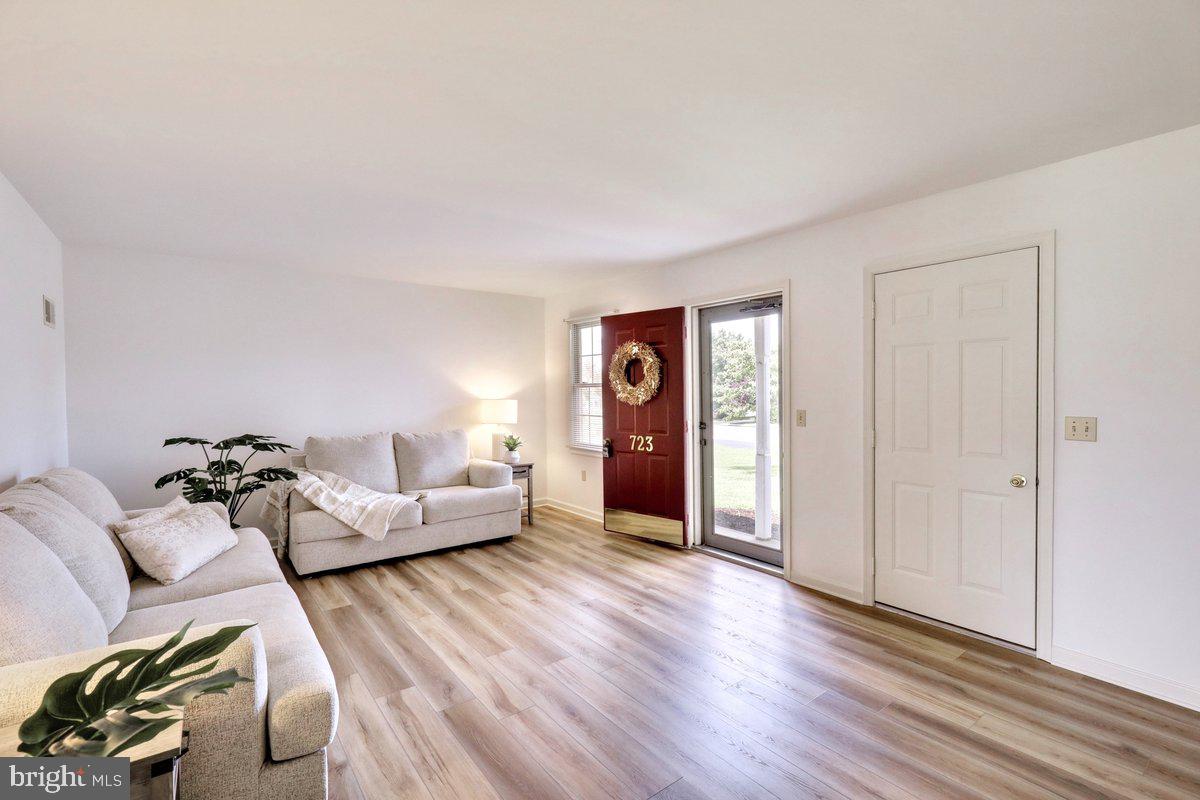 723 West 6th Street Lititz, PA 17543 - Photo 8 of 27 a living room with furniture and wooden floor