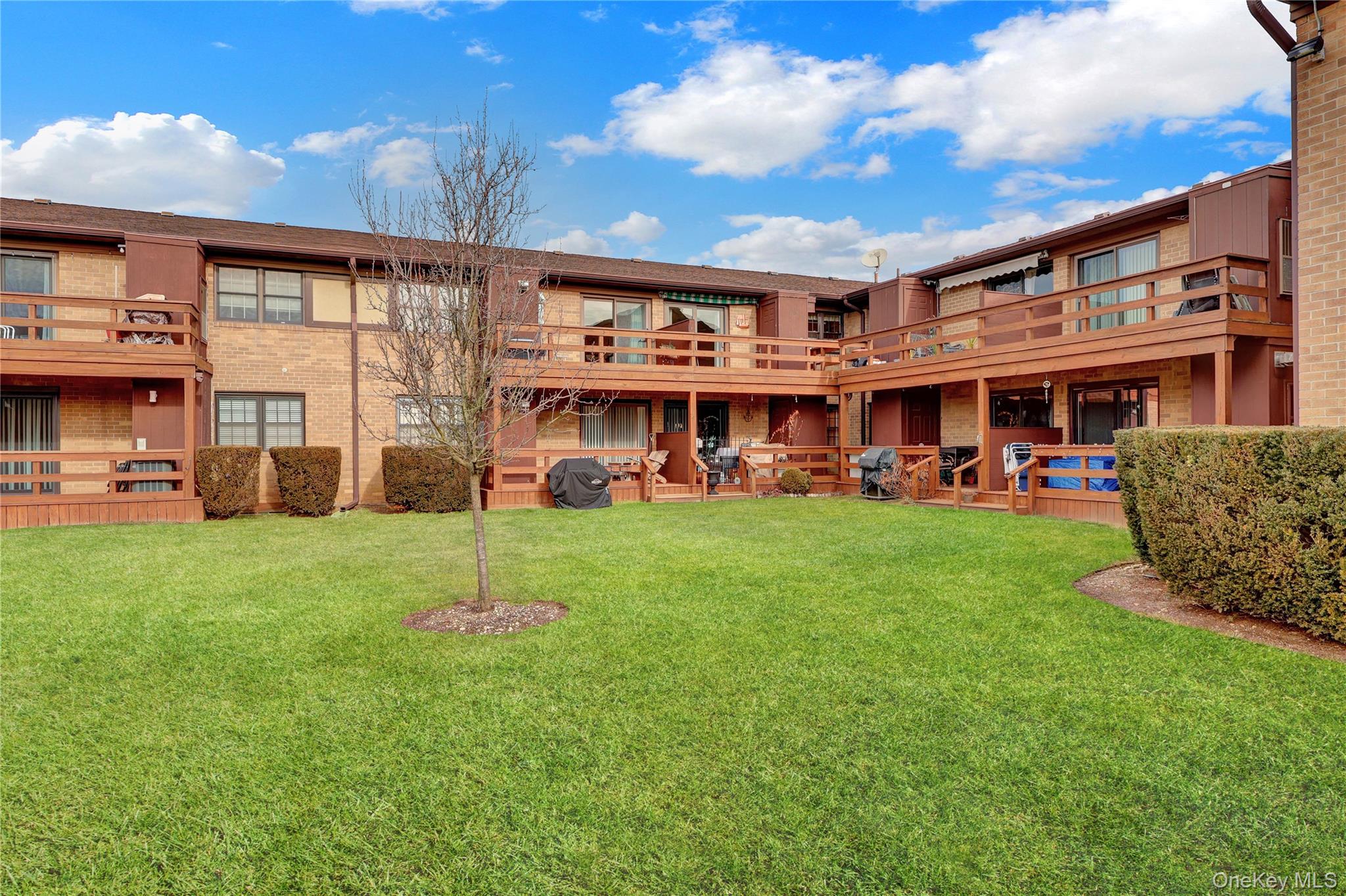 219 Mariners Way Copiague, NY 11726 - Photo 17 of 27 outside looking at unit