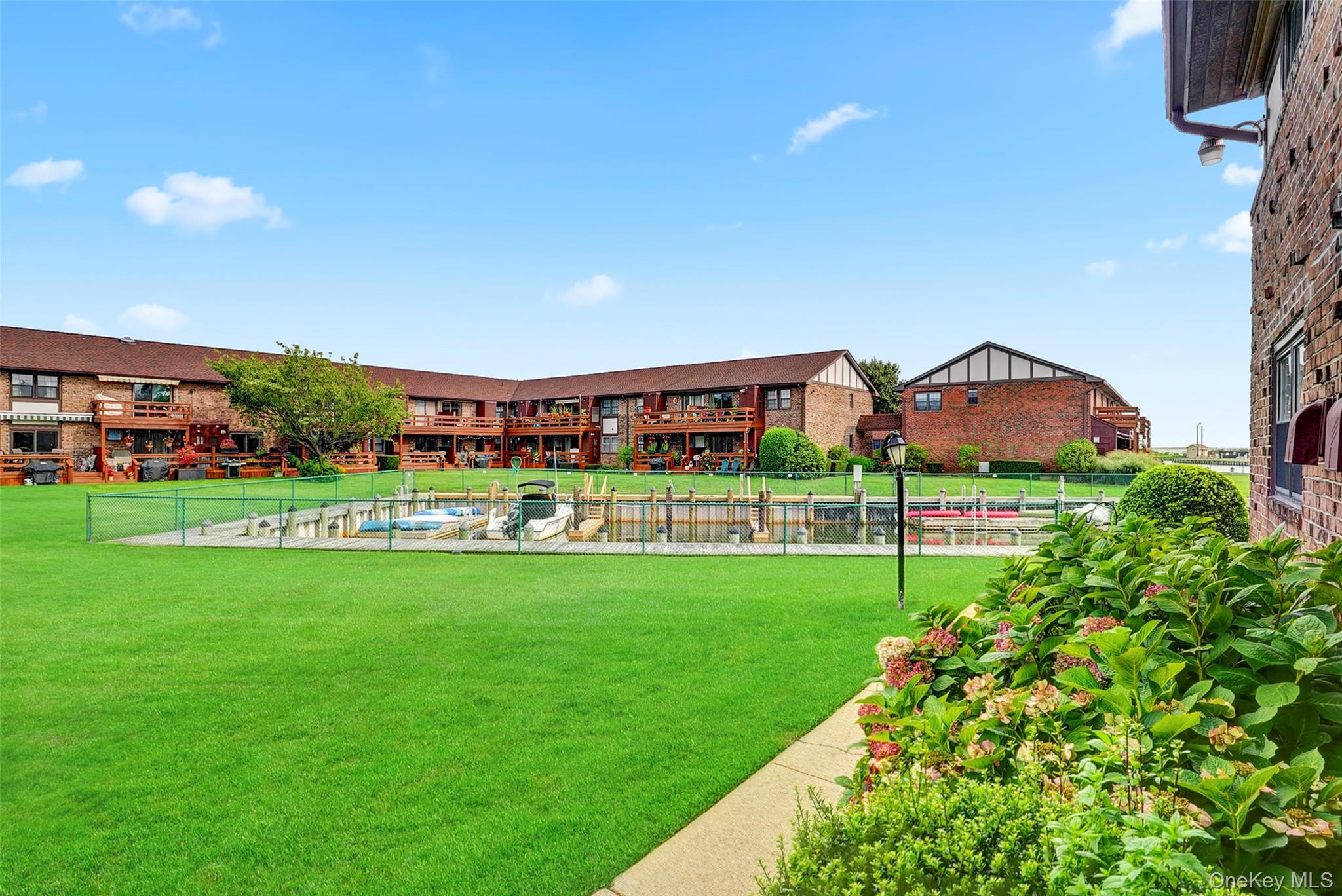 219 Mariners Way Copiague, NY 11726 - Photo 18 of 27 another viewgrassy common area