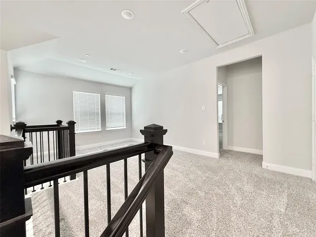 a view of an entryway with a staircase