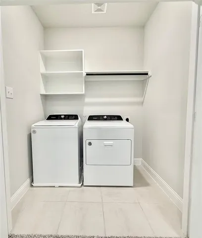 a view of backyard with a garden and plants