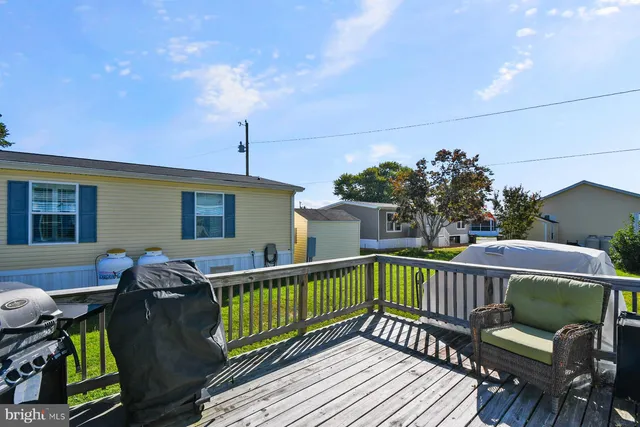 a view of a roof deck with couches