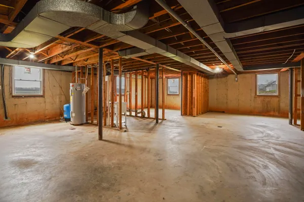 a view of a room with wooden walls