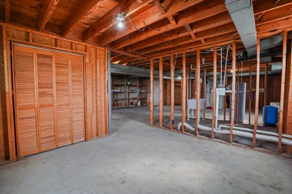 a view of an empty room with stairs