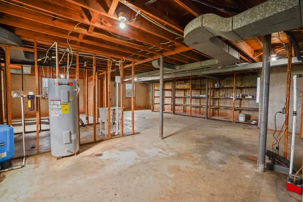 a view of an empty room with storage