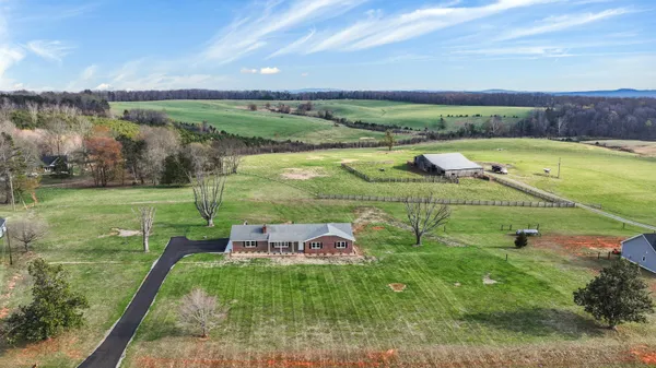 a view of a lake with a big yard