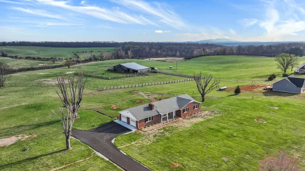 a garden view with a lake view