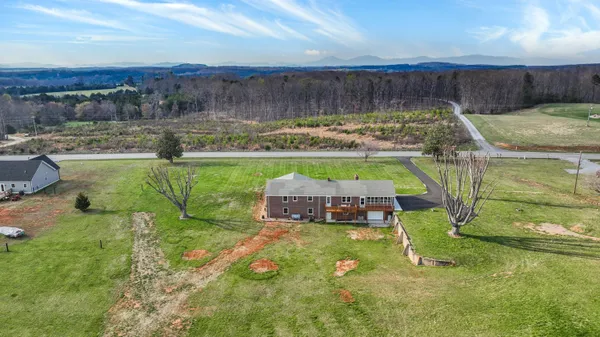 a view of yard with swimming pool and outdoor seating