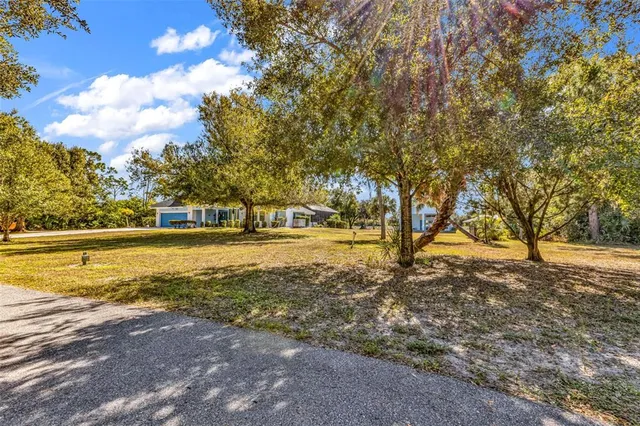 a view of entryway livingroom and hall with wooden floor