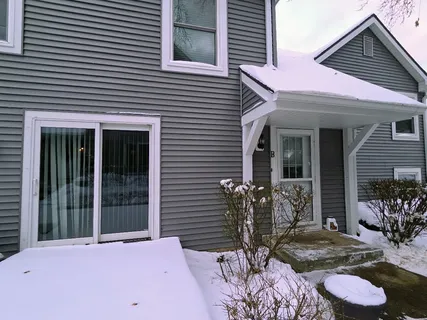 a front view of a house with patio