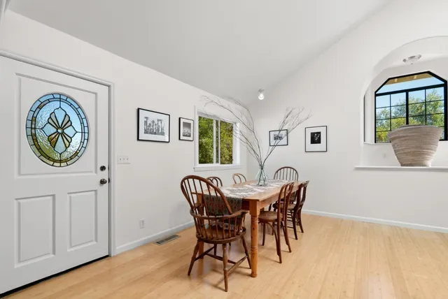 a view of a livingroom with furniture and a fireplace