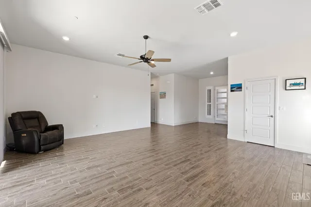 a view of a livingroom with wooden floor