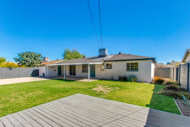a front view of a house with yard