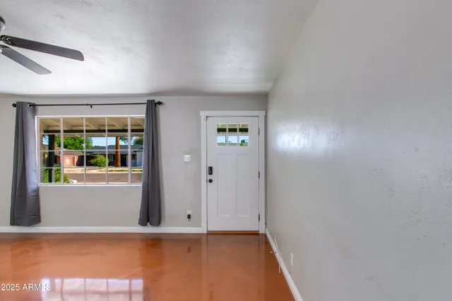 an empty room with window