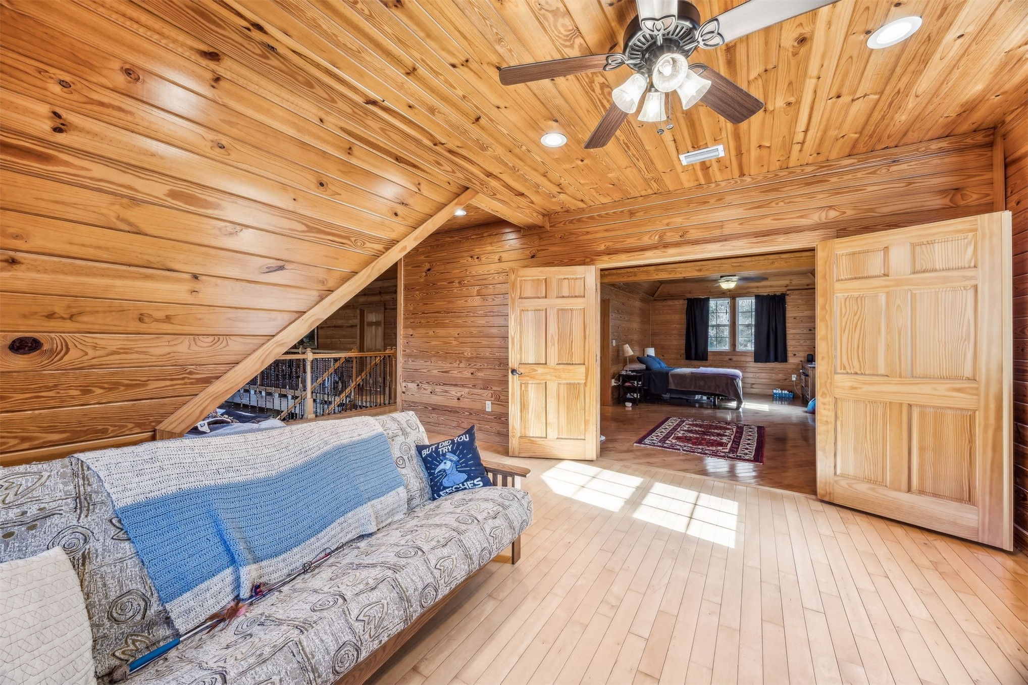 86205 Pages Dairy Road Yulee, FL 32097 - Photo 27 of 56 a living room with furniture and a wooden floor