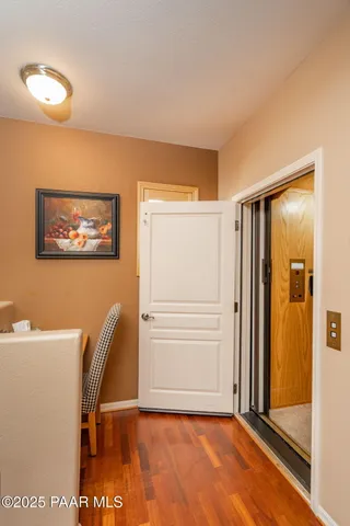 a view of a hallway with workspace