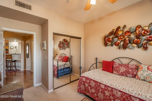 a spacious bathroom with a sink toilet and shower