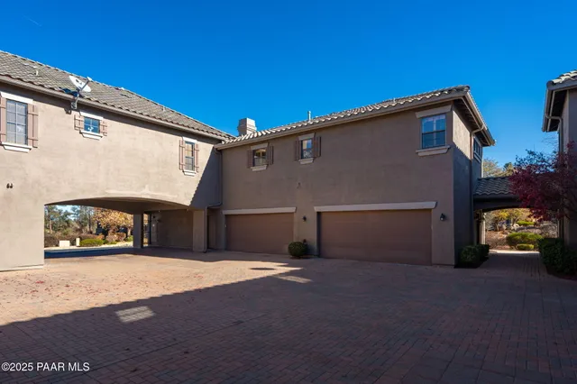 an aerial view of a house with a garden