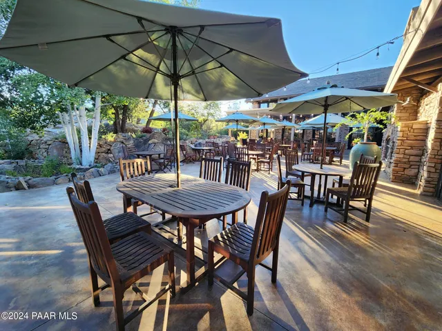 a view of a swimming pool with chairs