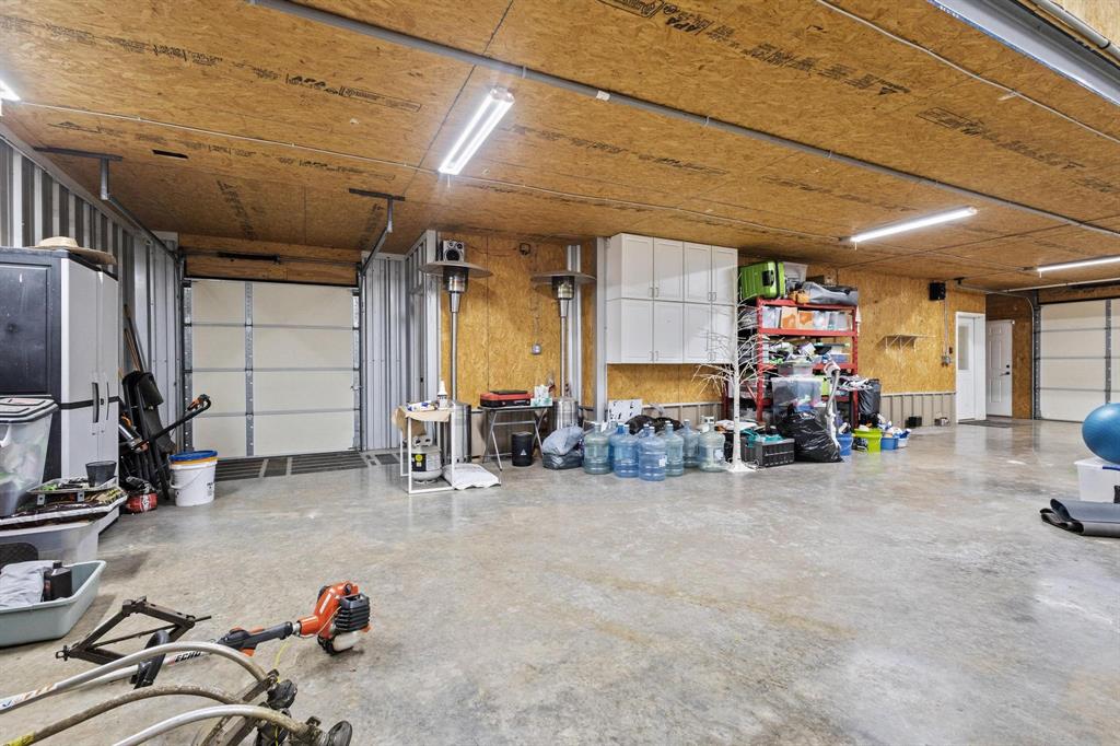 595 Pleasant Home Road Sherman, TX 75092 - Photo 25 of 40 a view of a room with gym equipment