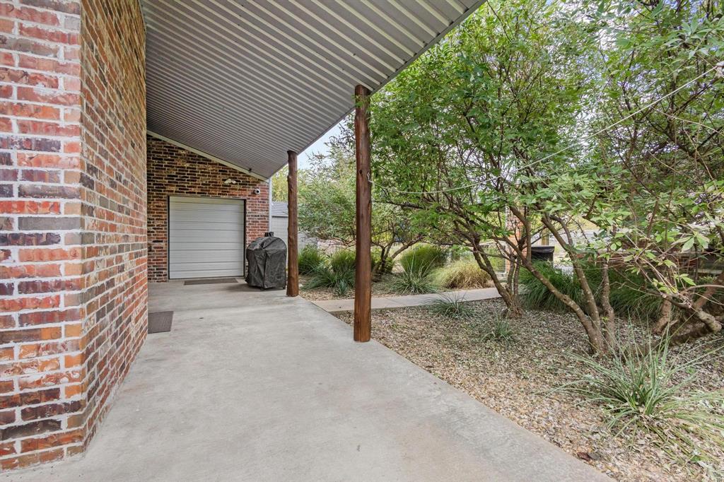 595 Pleasant Home Road Sherman, TX 75092 - Photo 35 of 40 a view of a house with backyard and trees
