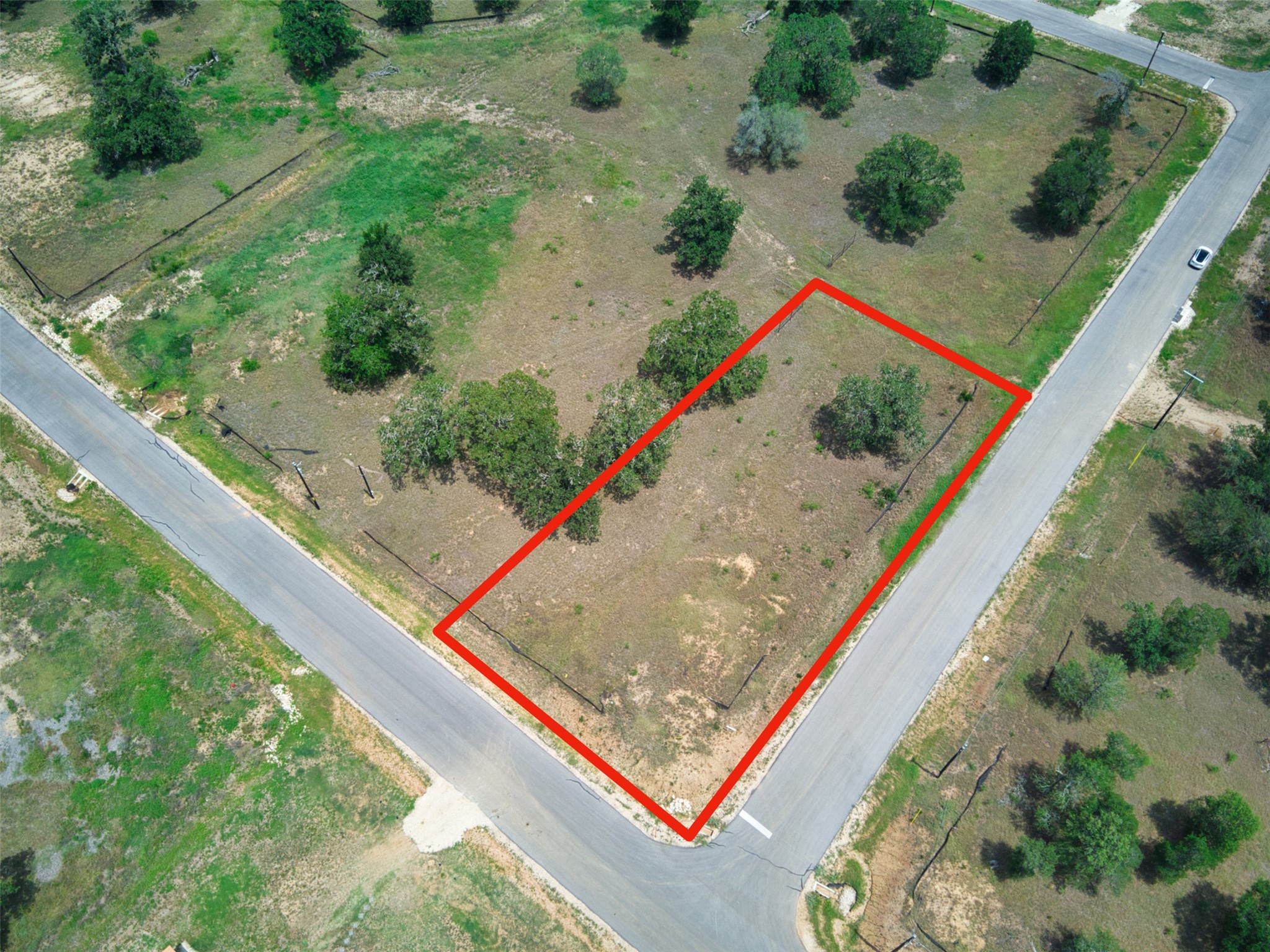 1067 Ferguson Loop Dale Dale, TX 78616 - Photo 2 of 15 a view of a yard with a flat screen tv