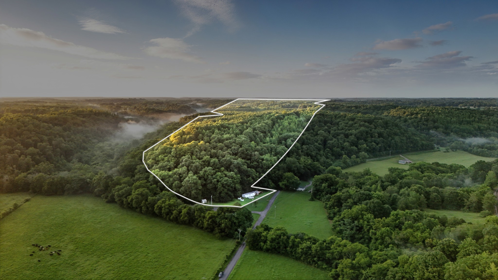 0 West Hollow Road Goodspring, TN 38460 - Photo 15 of 99 an aerial view of a golf course with a lake view