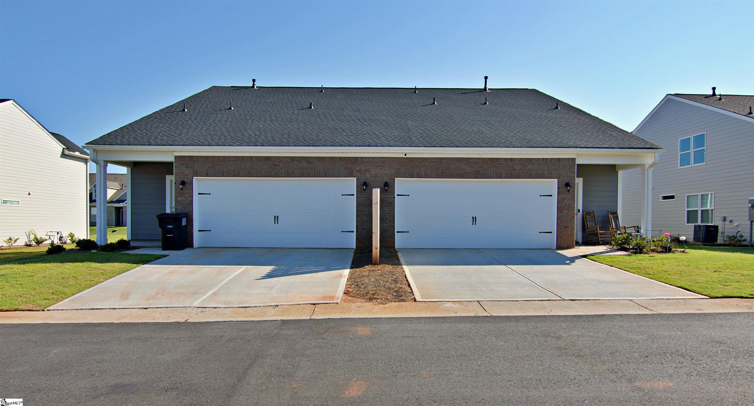 111 Village Main Anderson, SC 29621 - Photo 25 of 26 This townhome owns the garage on the right this photo shows the 2 unit building