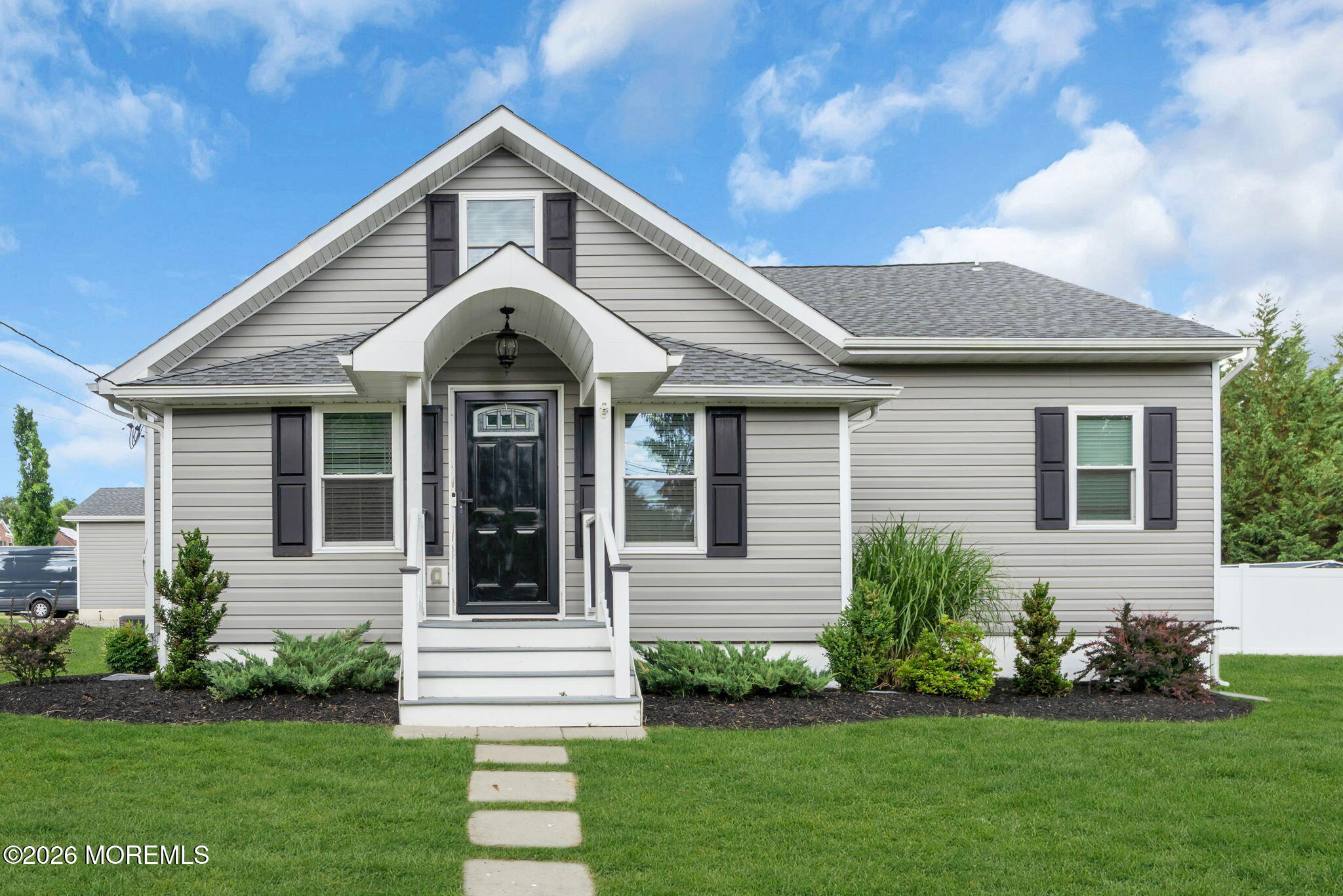 181 Locust Avenue Howell, NJ 07731 - Photo 3 of 66 a front view of a house with a yard