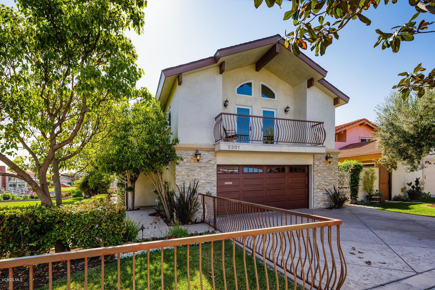 2301 Peninsula Road Oxnard, CA 93035 - Photo 2 of 37 a front view of house with yard