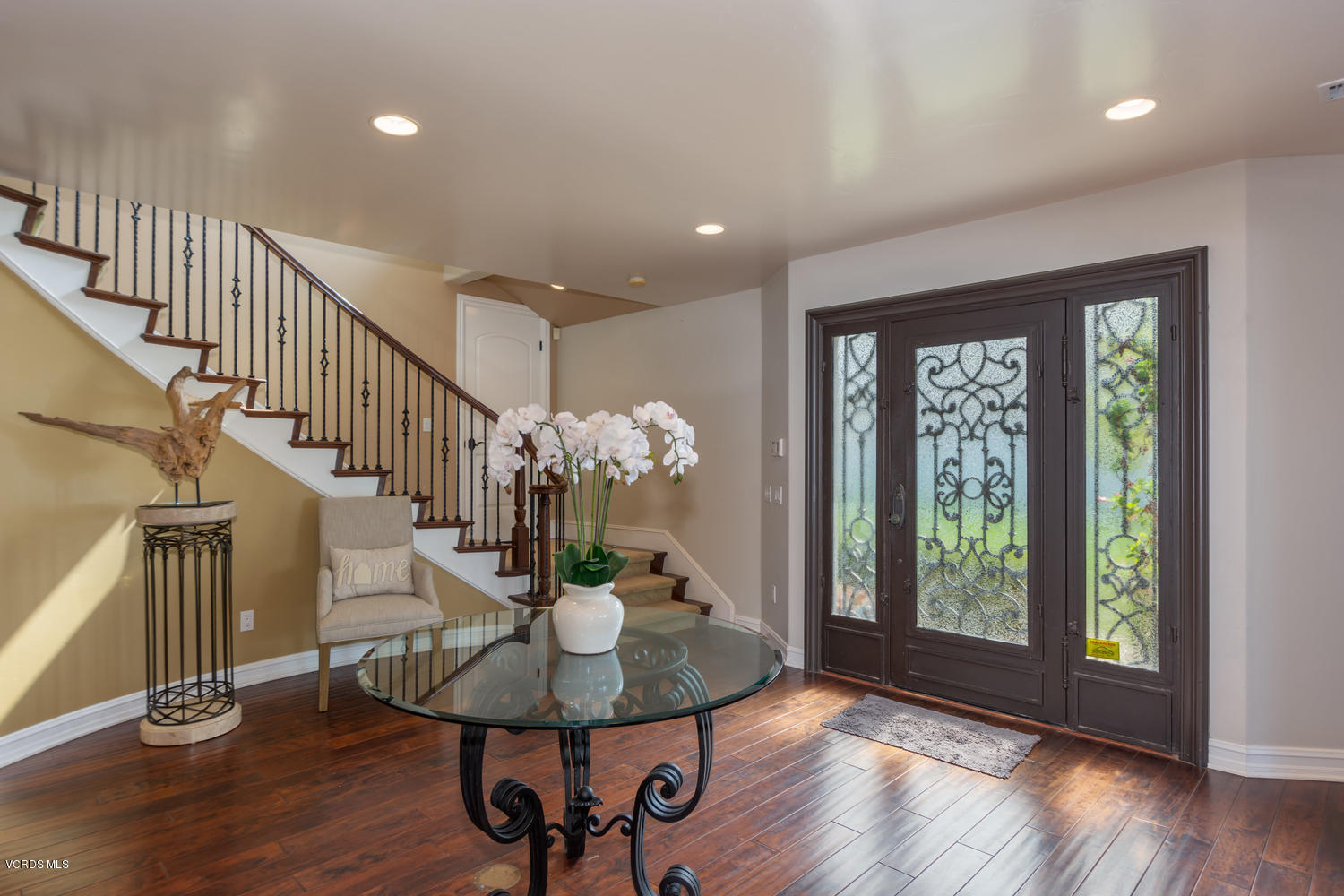 2301 Peninsula Road Oxnard, CA 93035 - Photo 3 of 37 a view of a dining room with furniture window and wooden floor