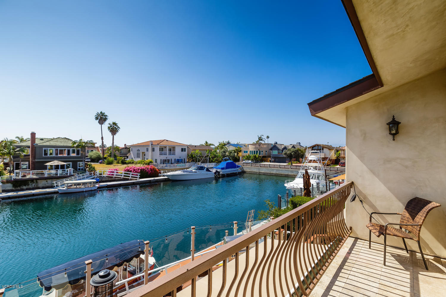 2301 Peninsula Road Oxnard, CA 93035 - Photo 26 of 37 a view of a lake from a balcony