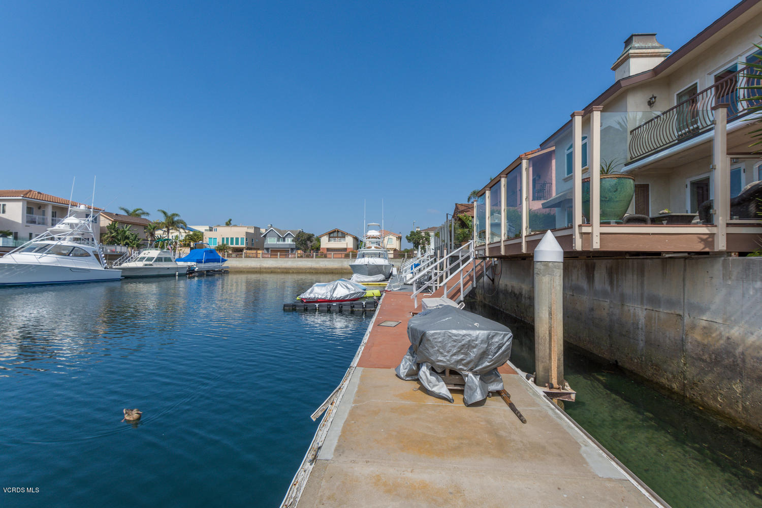 2301 Peninsula Road Oxnard, CA 93035 - Photo 37 of 37 a view of a lake with a house