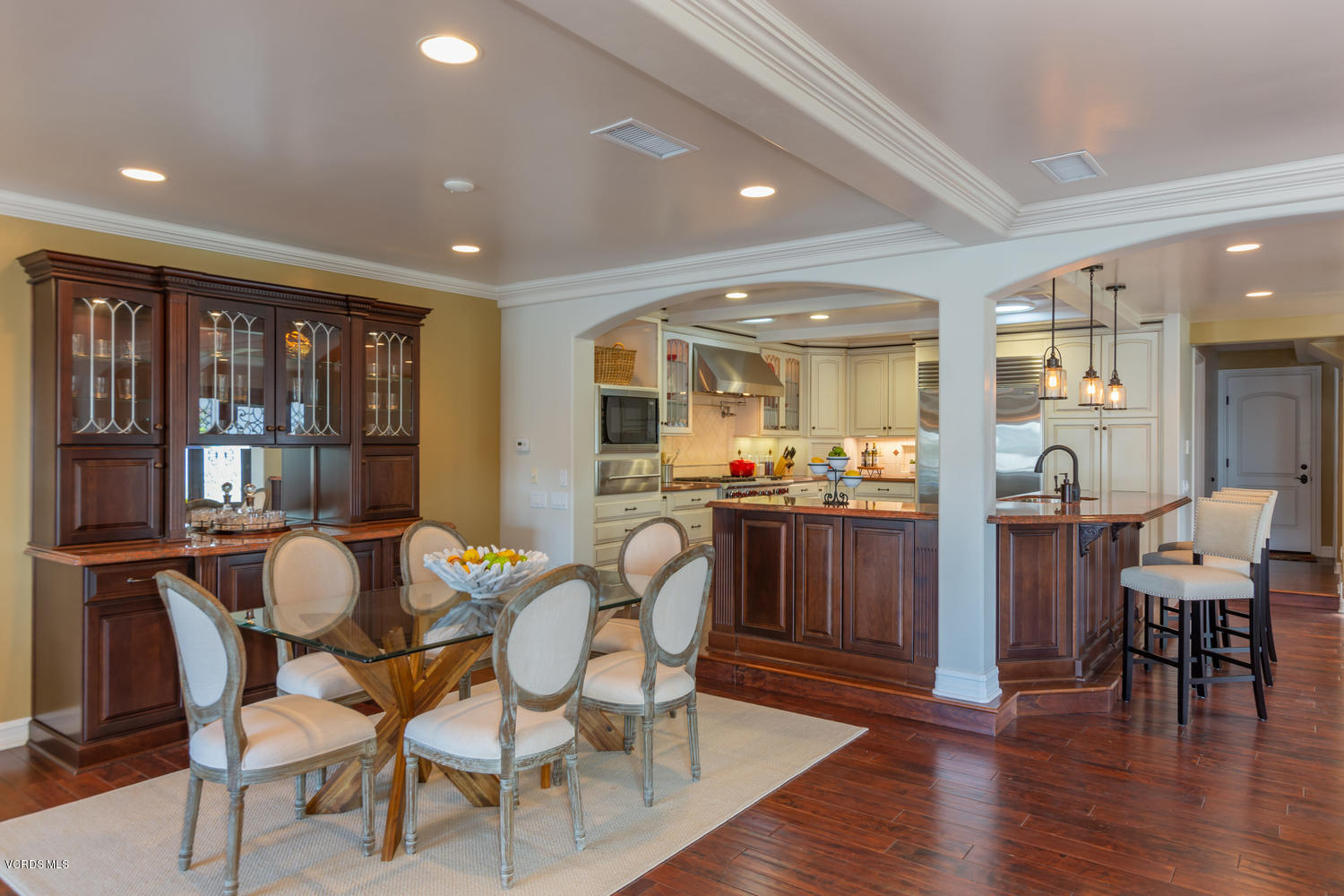 2301 Peninsula Road Oxnard, CA 93035 - Photo 8 of 37 a view of a dining room with furniture and wooden floor